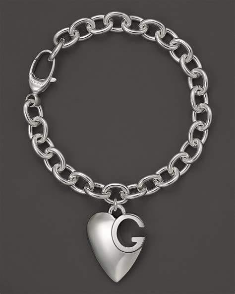 gucci sterling silver and wood bracelets|Gucci sterling silver charm bracelet.